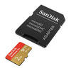 SanDisk Extreme Go 2TB microSD card shown with a black SD adapter on a plain white background.
