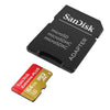 SanDisk Extreme Plus 64GB microSDXC memory card with its black SD adapter on a plain white background.