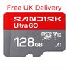 A Sandisk Ultra GO 128GB microSDXC V10 A1 memory card shown on a plain white background, with red text above reading 'Free UK Delivery'. The card is red and gray with white printed branding and specifications.