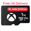 A Sandisk 1TB microSD Card for ROG Xbox Ally (X) - 1 TB  shown on a plain white background, with red text above reading 'Free UK Delivery'. The card is black with a red Sandisk logo area, a white Xbox-style X logo, and white text indicating 1TB, microSD, V30, and Class I.