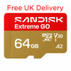 A Sandisk Extreme GO 64GB microSDXC V30 A2 flash memory card shown on a plain white background, with red text above reading 'Free UK Delivery'. The card is red on the upper half and gold on the lower half, with white printed branding and specifications.